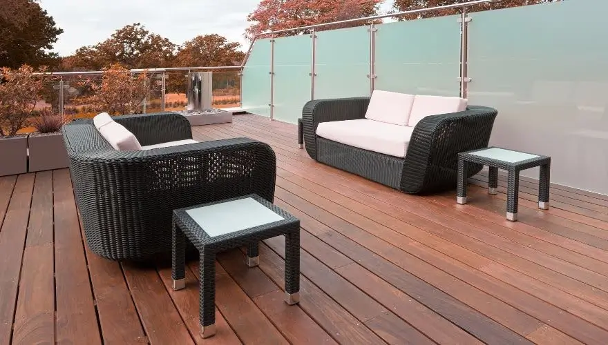 Composite deck with modern outdoor seating arrangement.